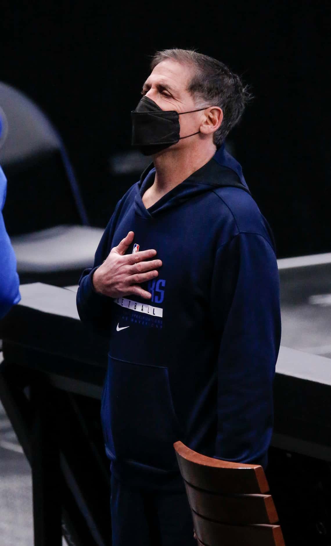 Dallas Mavericks owner Mark Cuban stands for the playing of the National Anthem before an...