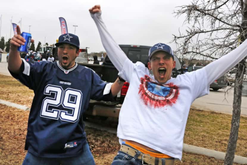 Enthusiastic Cowboys fans Cody Trudell and Kameron Fabian are ready for kickoff hours before...