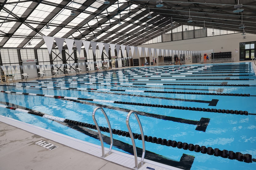 The newly formed boys and girls water polo teams at Forney High School complete a practice...