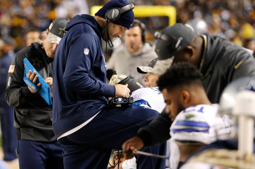 Dallas Cowboys quarterback Tony Romo (9) stands on the sideline in the second quarter at...