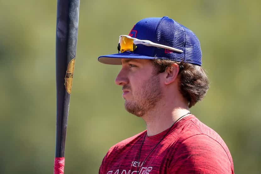 Outfielder Trevor Hauver prepares to take batting practice during a Texas Rangers minor...