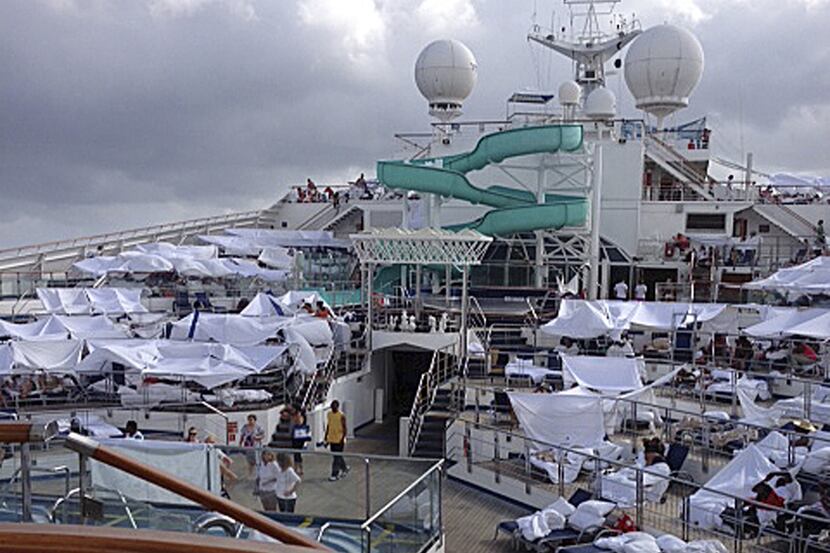 Passengers erected makeshift tents on the Triumph's deck while it was adrift in the Gulf of...