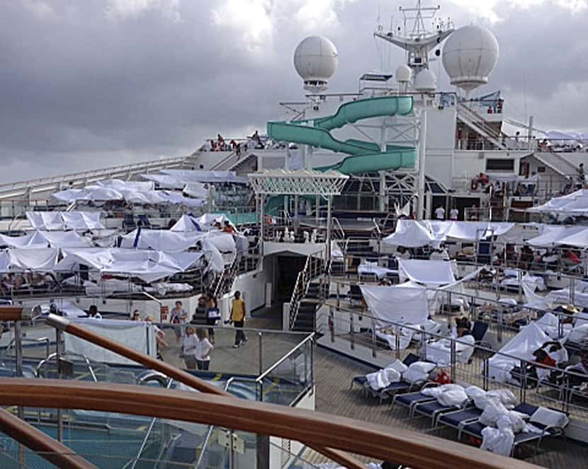 Passengers erected makeshift tents on the Triumph's deck while it was adrift in the Gulf of...