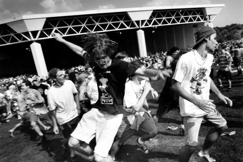 Shot August 22, 1991: The crowd on the lawn dances to the sounds of Fishbone during...