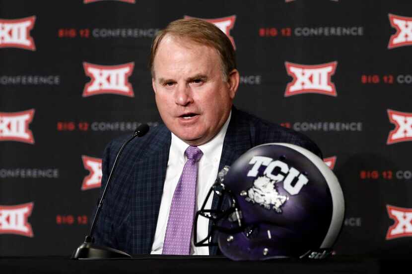 TCU head football coach Gary Patterson responds to questions from reporters at Big 12...