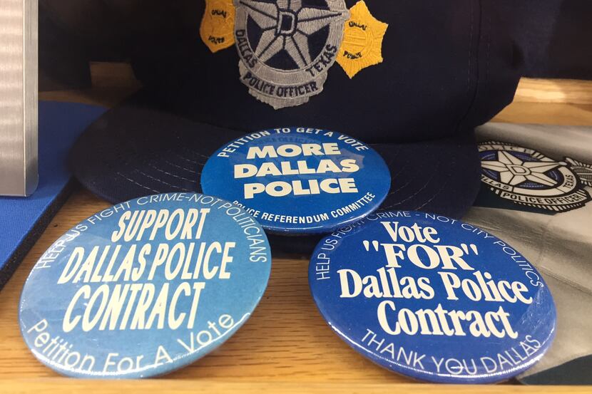 Buttons on display at the Dallas Police Association's headquarters reveal some of the...