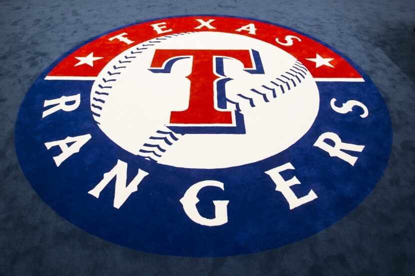 FILE - The team logo fills the center of the clubhouse in the Rangers' newly renovated...