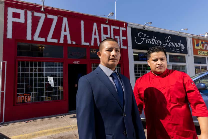 Pizza Large owners Calixto Saquic and brother Jose Saquic outside of their restaurant on...