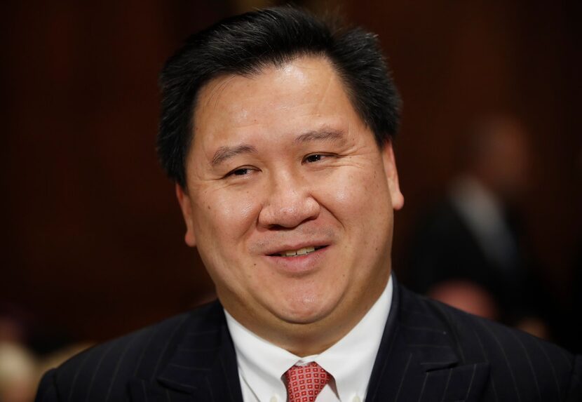 James Ho talks to family members before a Senate Judiciary Committee hearing on nominations...