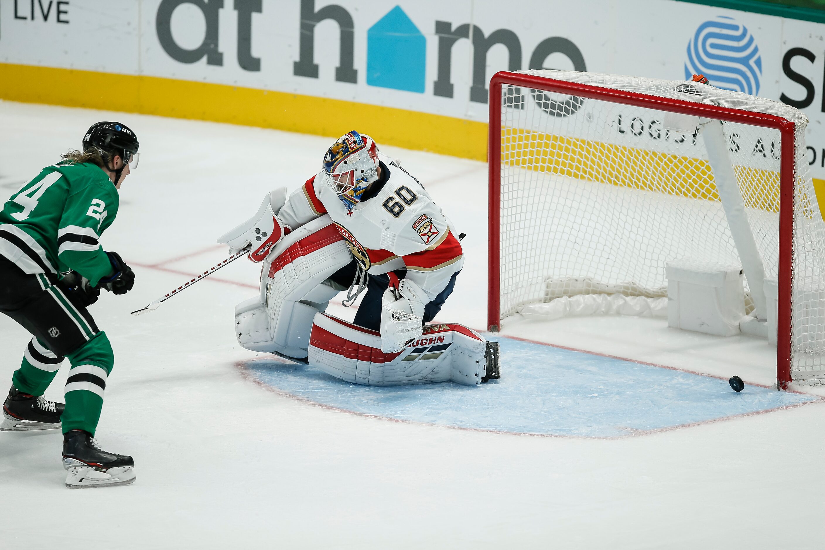 Florida Panthers goaltender Chris Driedger (60) deflects a shot from Dallas Stars forward...