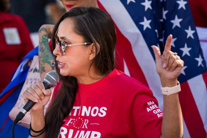 Martha Doss, 37, of San Marcos, Texas speaks during a pro-Trump rally at the Hays County...