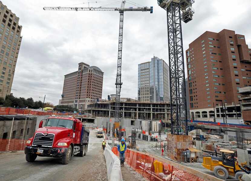 
Construction workers were hard at work on an office tower at McKinney and Olive in Uptown...