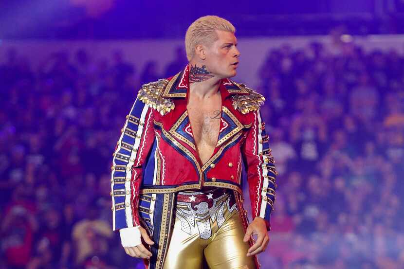 Cody Rhodes enters the ring before a match against Seth Rollins at WrestleMania 38 at AT&T...