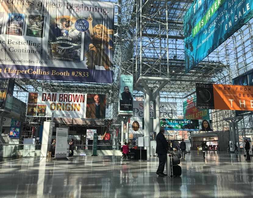 Book-promoting banners fill the Jacob K. Javits Convention Center in New York on May 31 at...