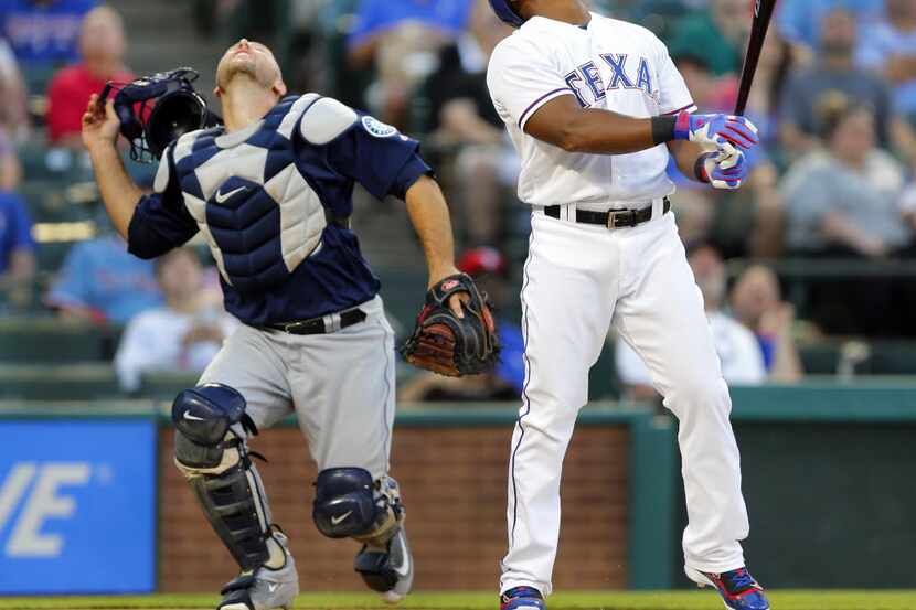 Texas Rangers third baseman Adrian Beltre (29) looks at his first inning pop-up as Seattle...