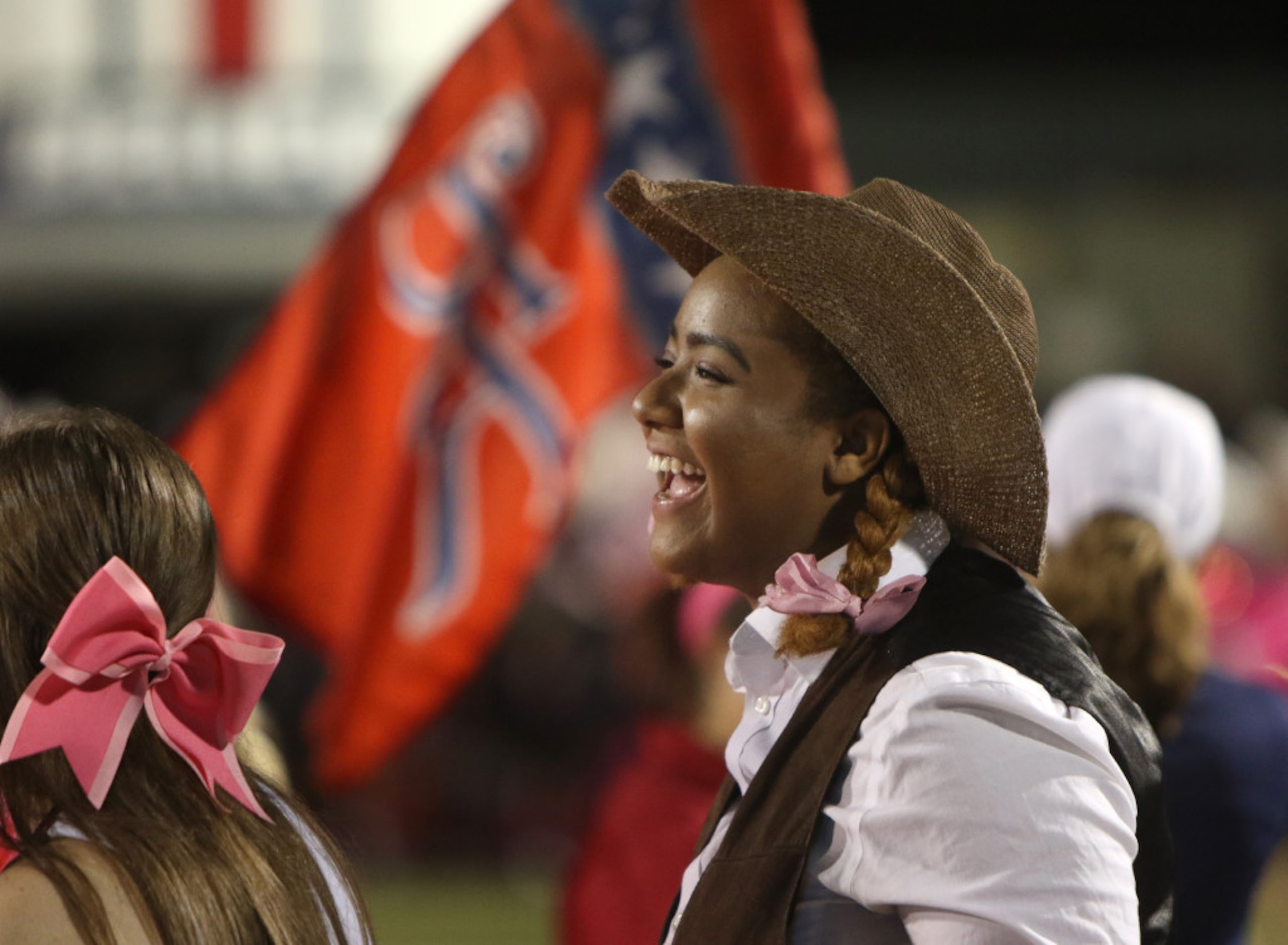 Richland senior Stanley Rodriguez shows her excitement as her team's official mascot, "Rebel...