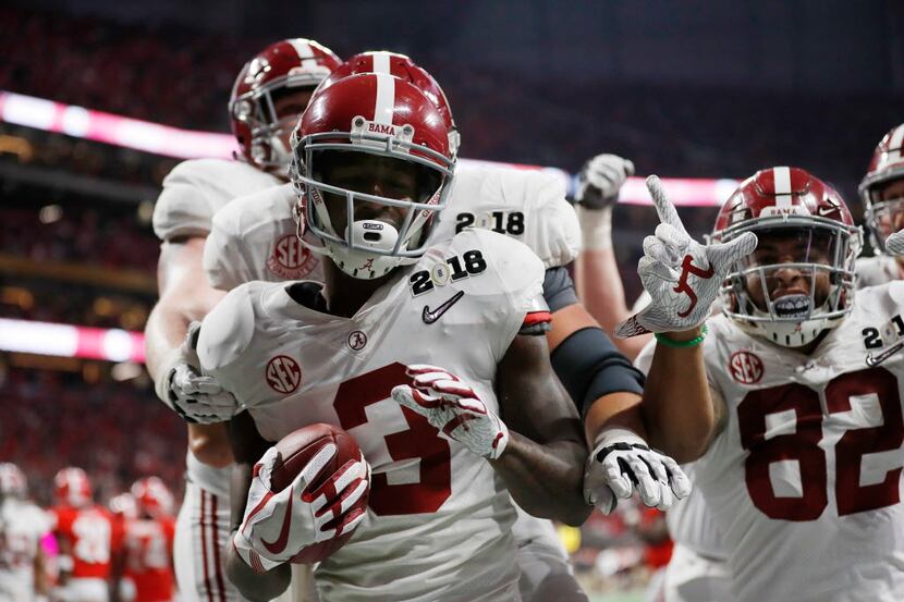 Alabama's Calvin Ridley celebrates his touchdown catch during the second half of the NCAA...