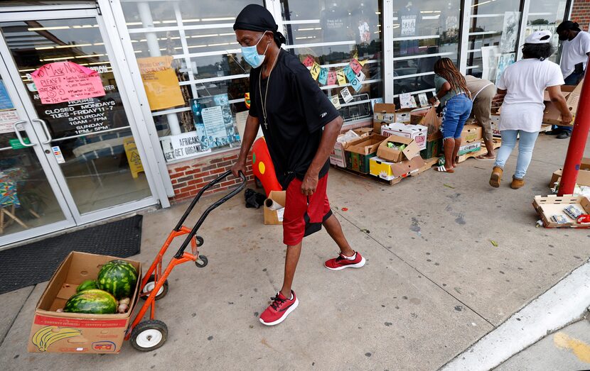 Van Hobbs found some watermelons and vegetables from a collection of donated food outside...