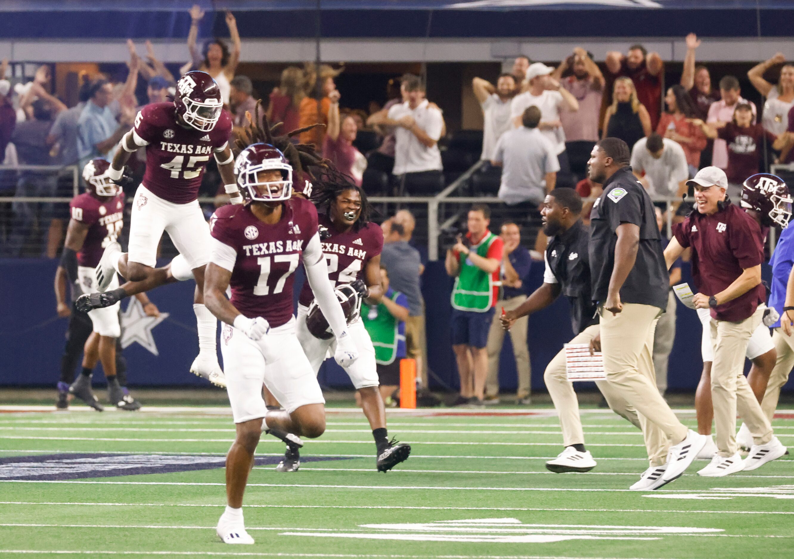 Texas A&M players celebrate as Arkansas misses to score from a field goal during the second...