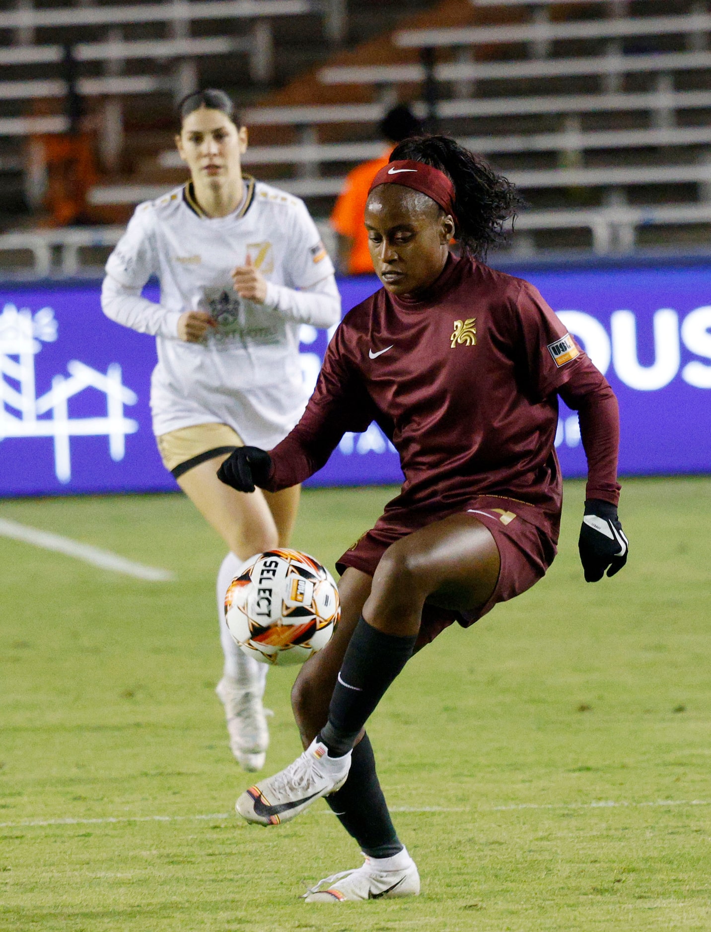 Dallas Trinity forward Chioma Ubogagu (14) controls the ball against Spokane Zephyr players...