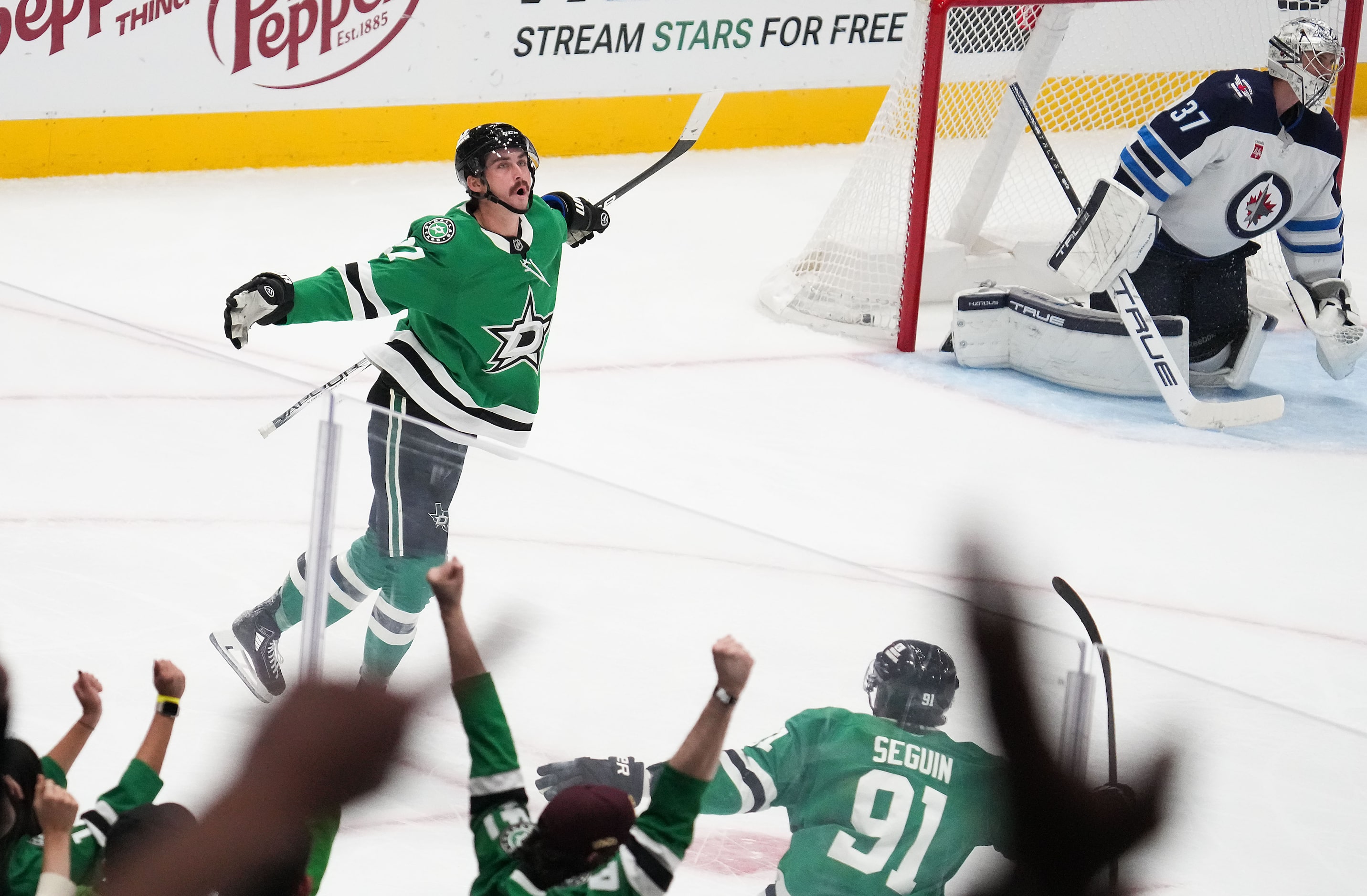 Dallas Stars left wing Mason Marchment (27) celebrates after scoring with 7:37 left in the...