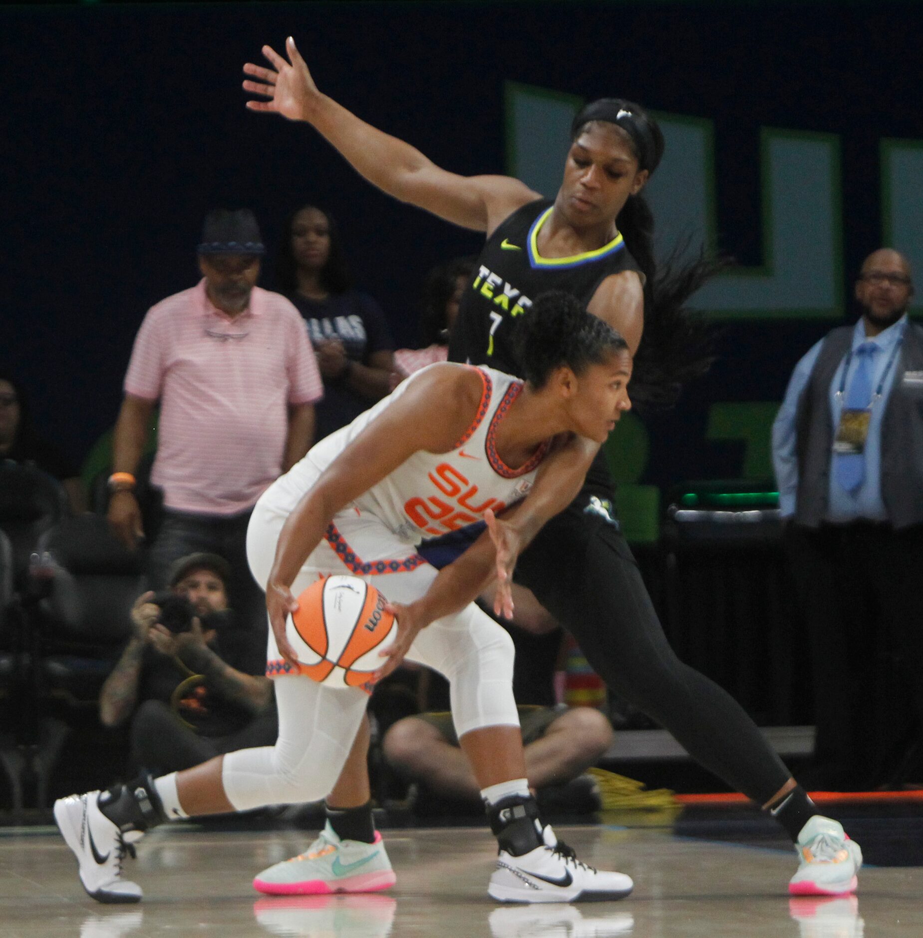 Dallas Wings center Tiera Mccowen (7) defends against Connecticut Sun forward Alyssa Thomas...