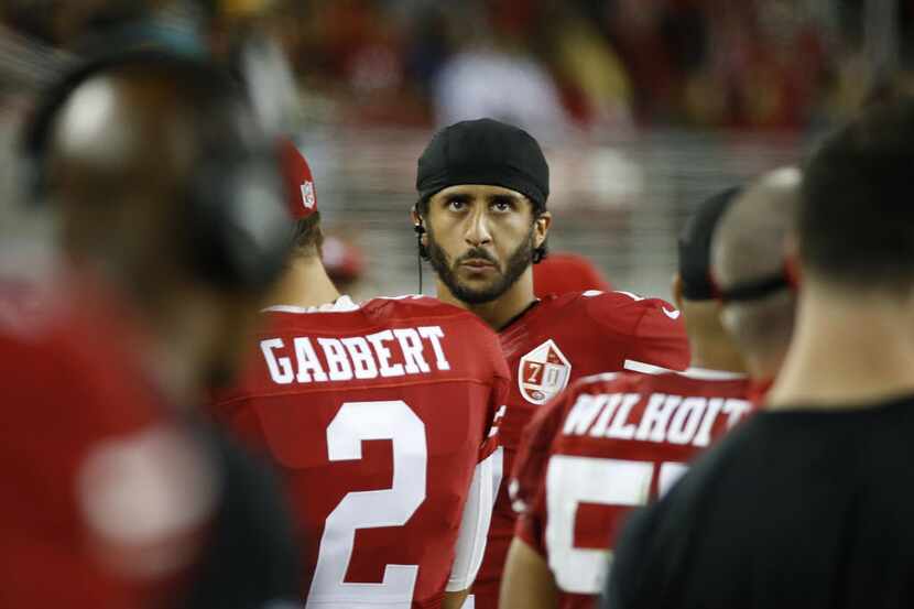 San Francisco 49ers quarterback Colin Kaepernick on the sidelines during the second half of...