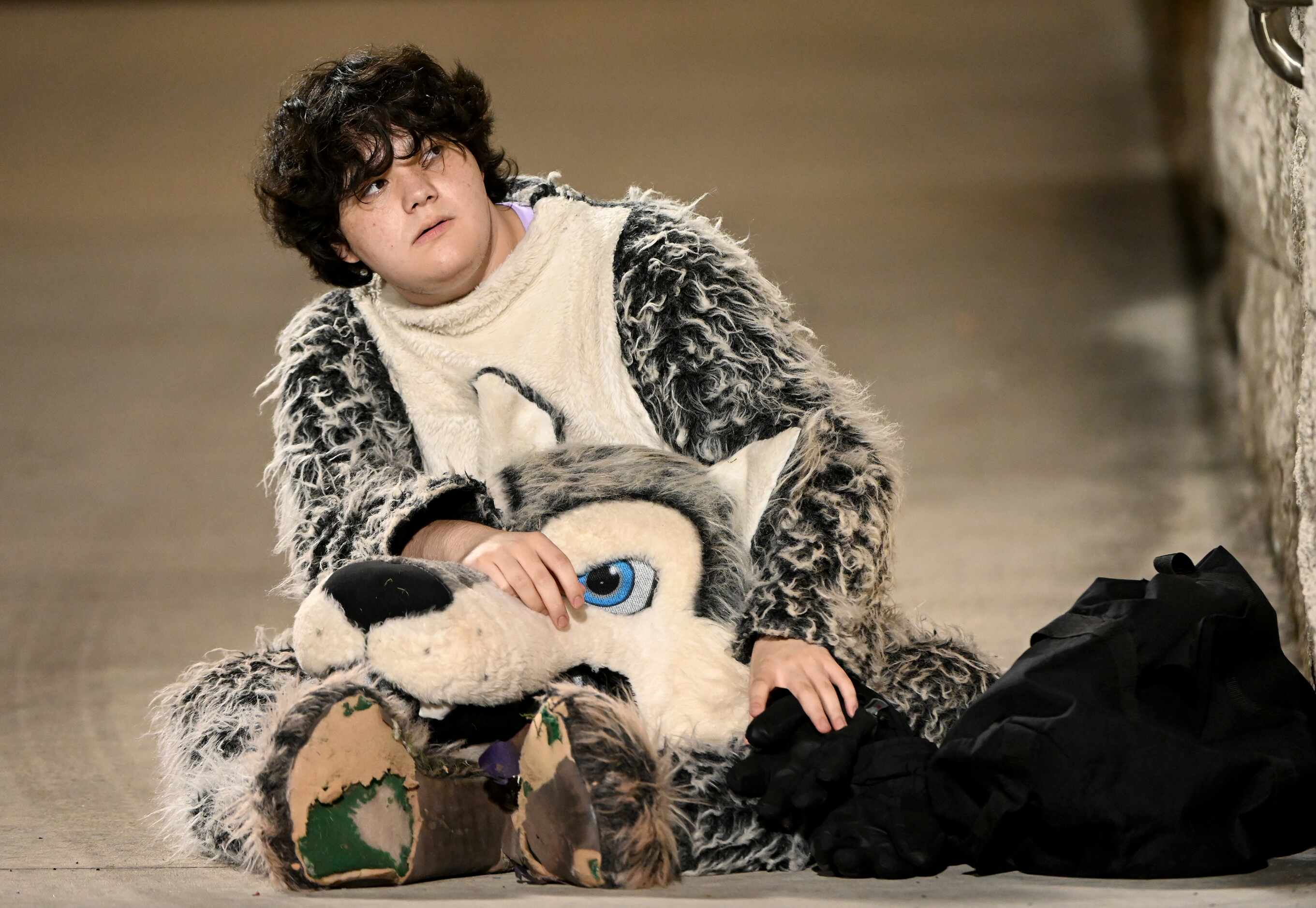 Talon Robles, Little Elm junior, takes a break from being Larry the Lobo in the first half...