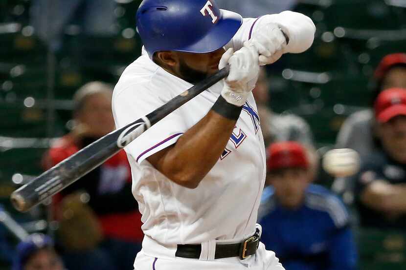 Texas Rangers shortstop Elvis Andrus (1) is hit by a pitch from Los Angeles Angels relief...