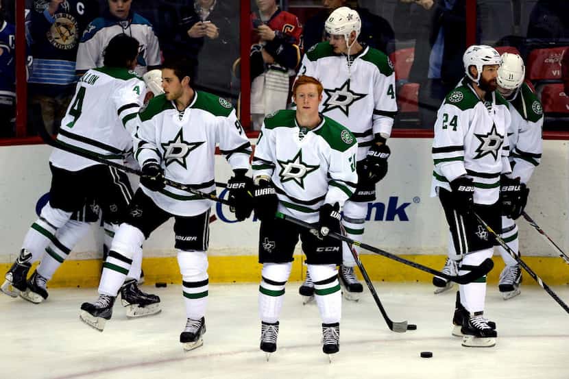 WASHINGTON, DC - APRIL 01: Cody Eakin #20 of the Dallas Stars and teammates warm up before...