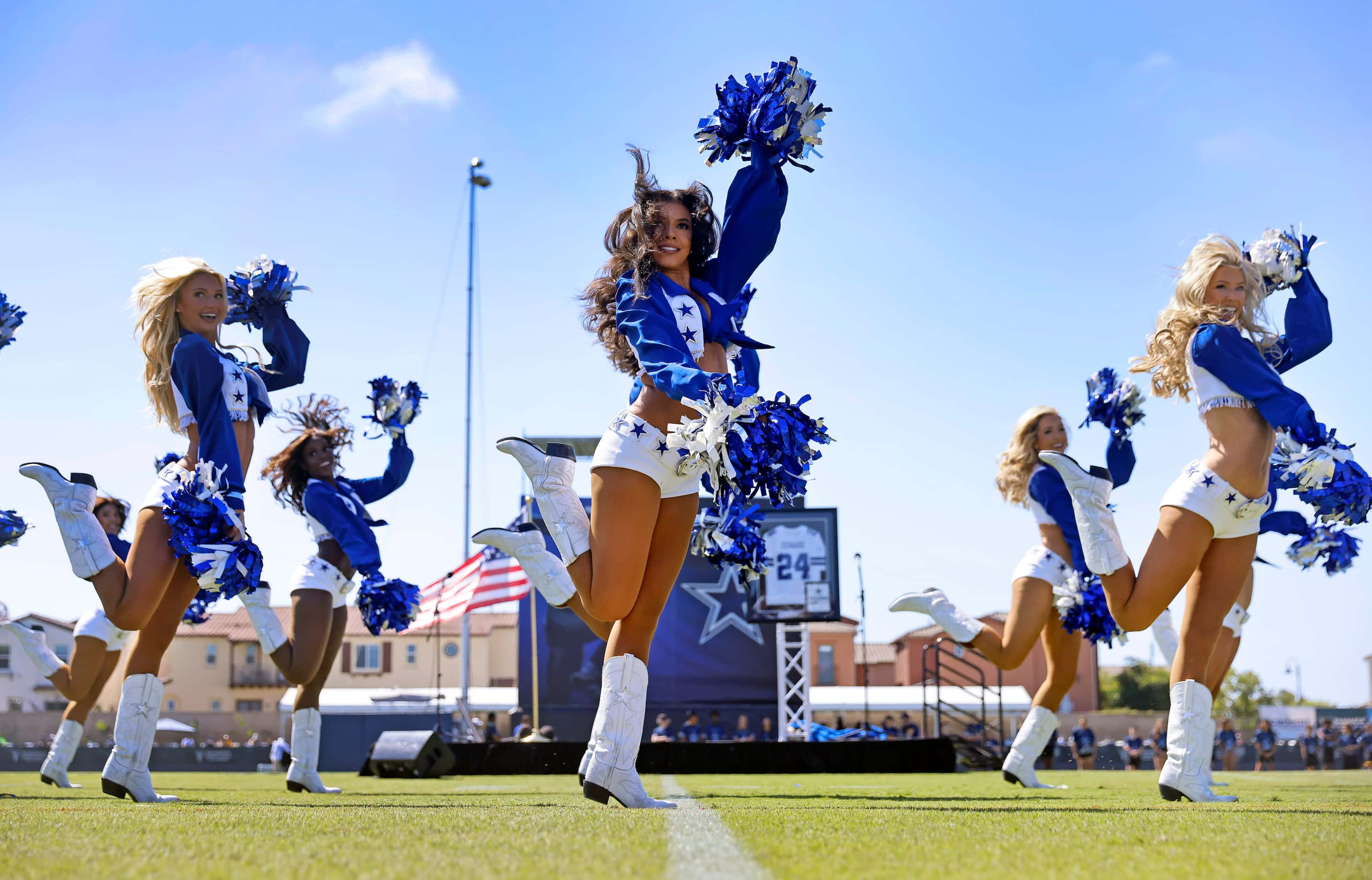 The Dallas Cowboys Cheerleaders perform during the annual training camp opening ceremony and...