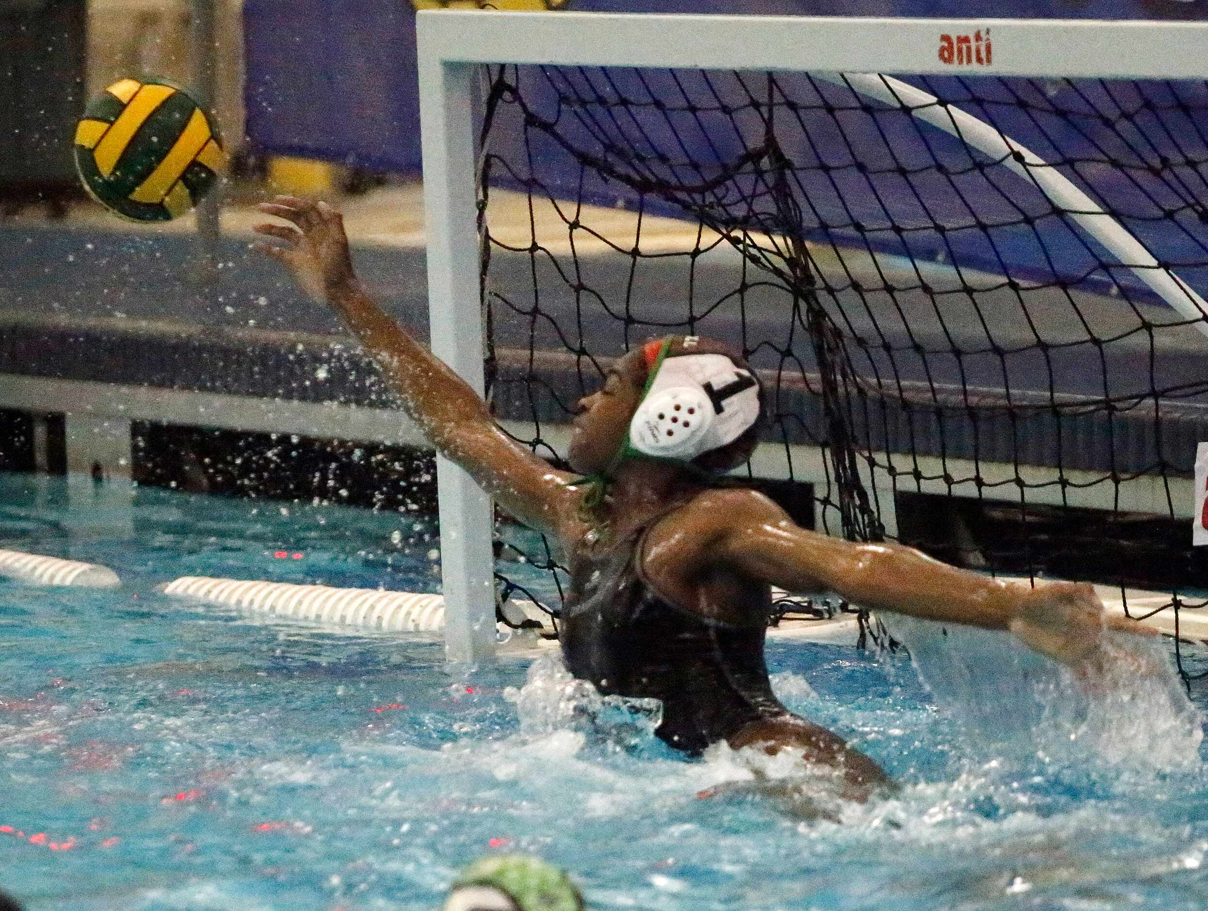 Southlake goal keeper Somto Okafo (1) blocks a shot attempt late in the game as Southlake...