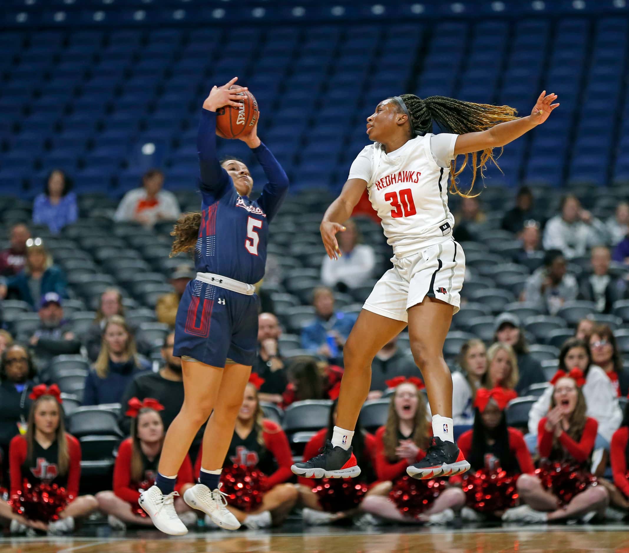 Frisco Liberty guard Jazzy Owens-Barnet #30 tries to steal the pass to Veterans Memorial...