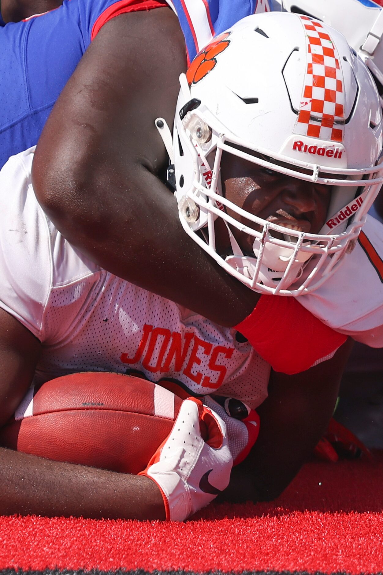 Jones High School Dylan Wade (7) scores a touchdown during the game between Jones High...