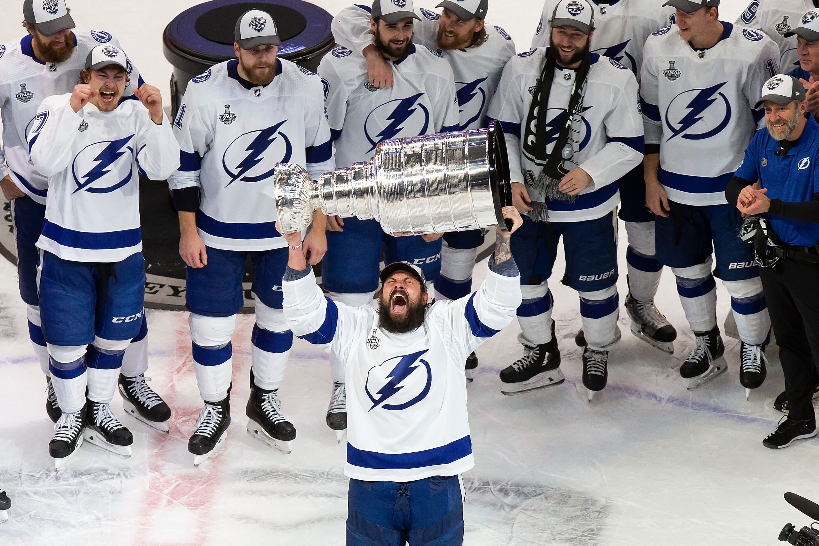 Zach Bogosian (24) of the Tampa Bay Lightning hoists the Stanley Cup after defeating the...