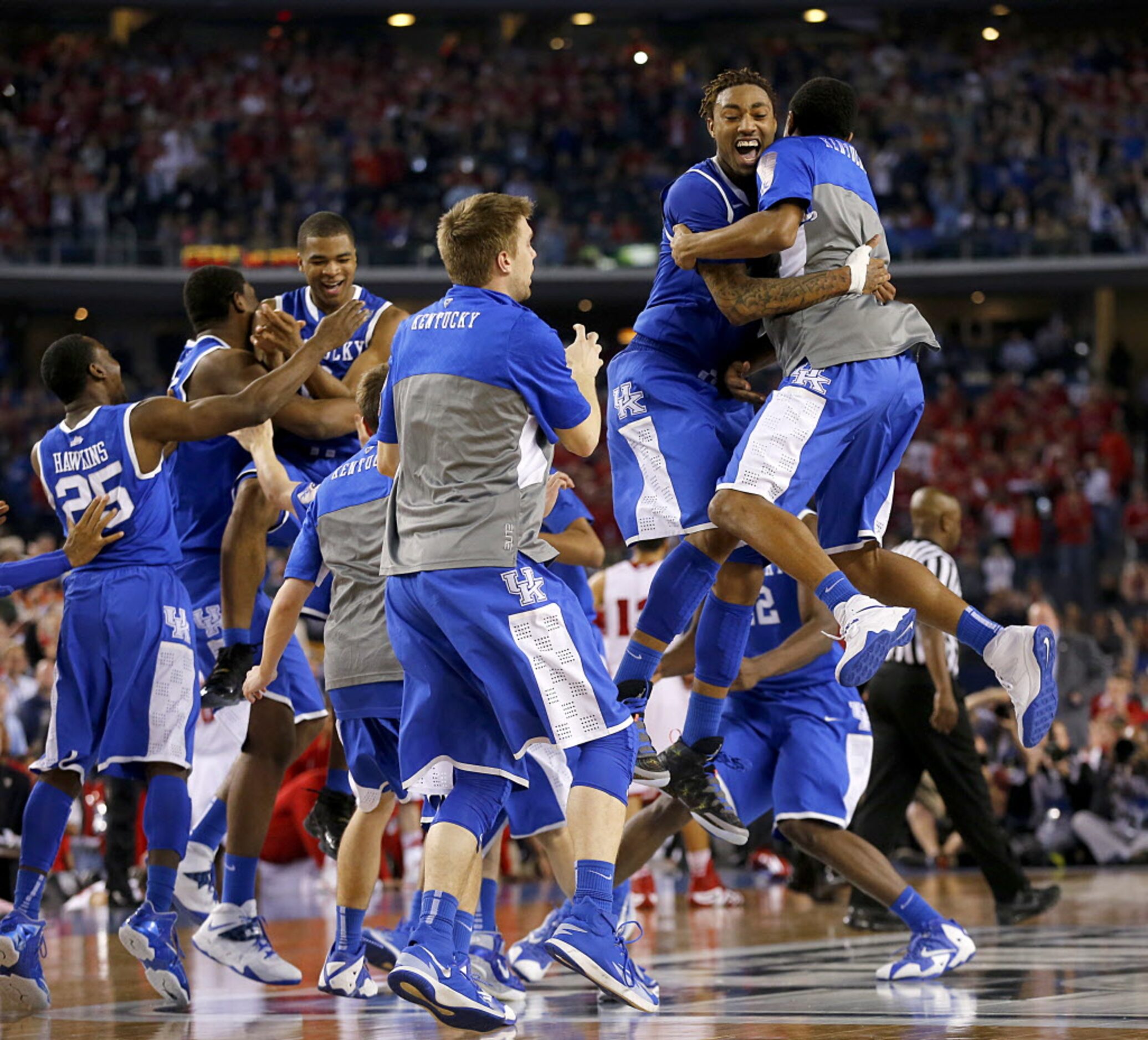 Kentucky Wildcats players celebrate their win over the Wisconsin Badgers in NCAA Final Four...