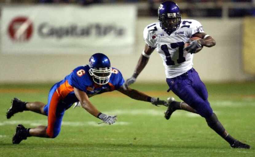TCU wide receiver Cory Rodgers (17) out runs Boise State's Julius Brown (6) in the first...