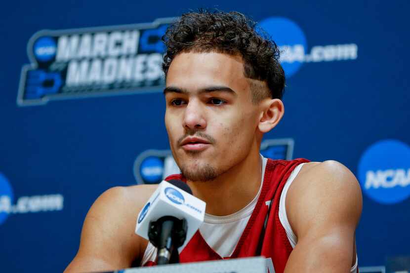 FILE - In this March 13, 2018, file photo, Oklahoma's Trae Young answers questions during a...