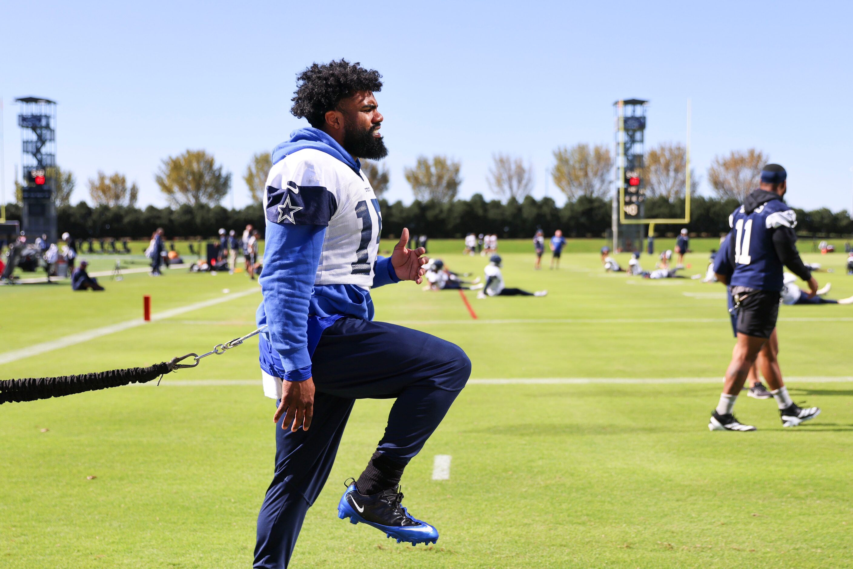 Dallas Cowboys running back Ezekiel Elliott takes part in a drill during a team practice on...