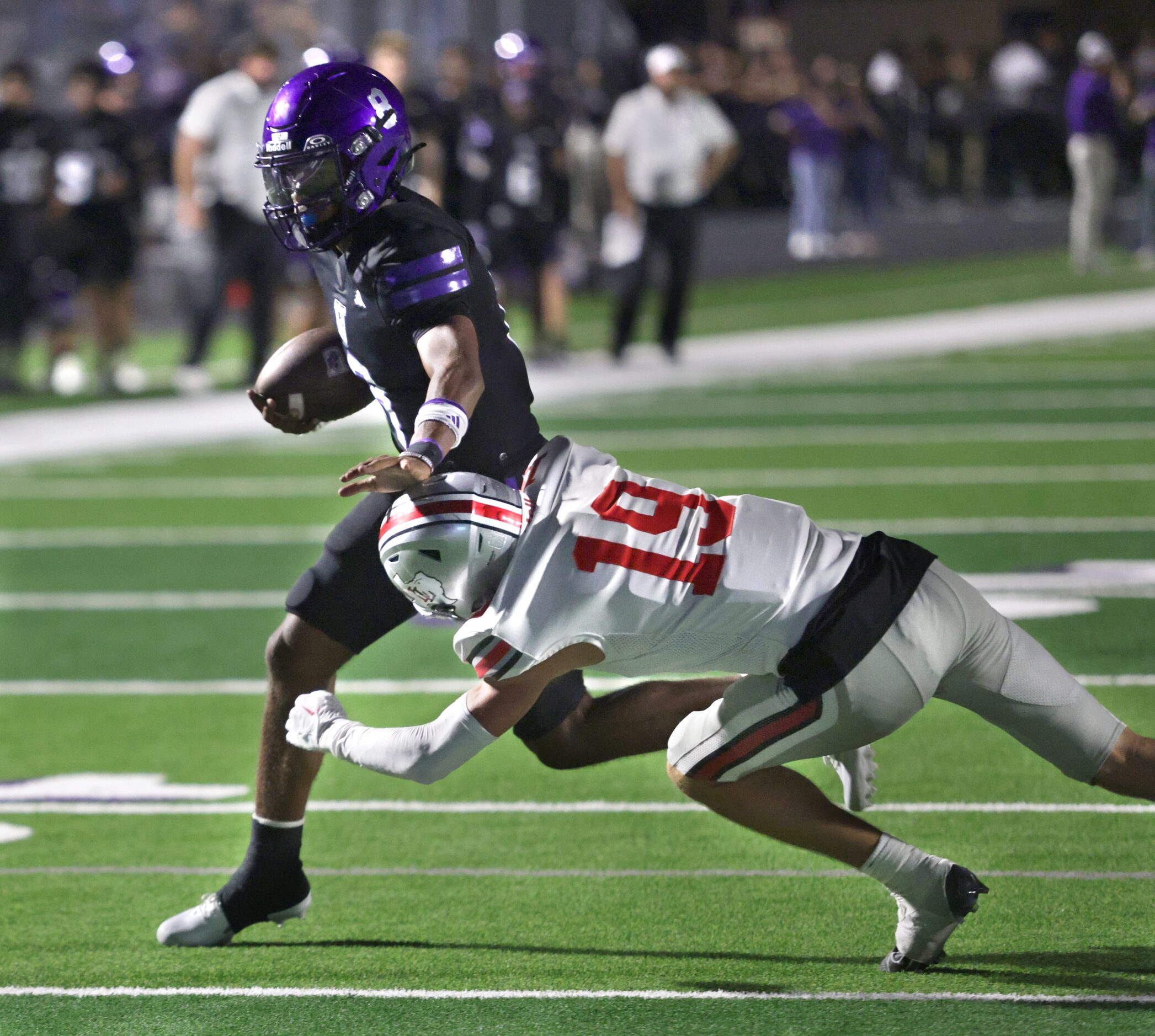 Anna player #8 Ziondre Williams breaks free from Lovejoy player #19 Brock Bernal to score a...