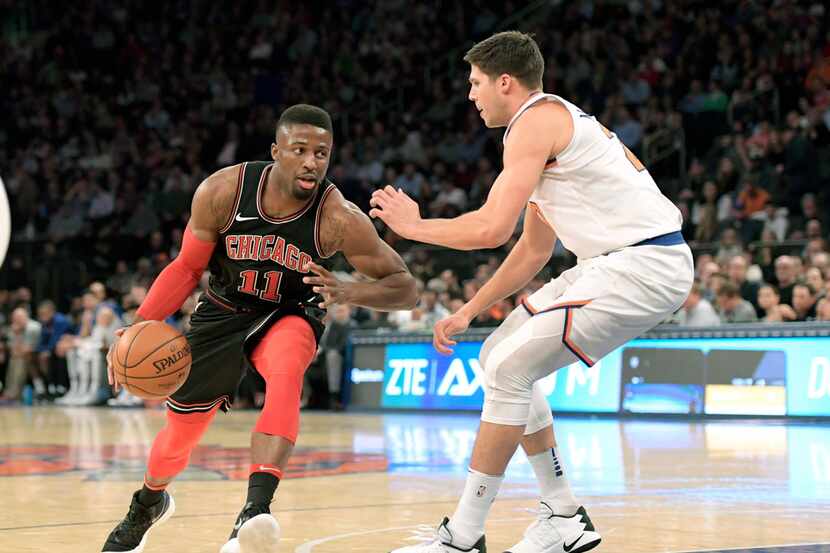 Chicago Bulls guard David Nwaba (11) drives to the basket as New York Knicks forward Doug...