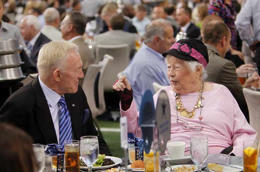 Jerry Jones, left, owner of the Dallas Cowboys, visits with his mother Arminta Jones during...