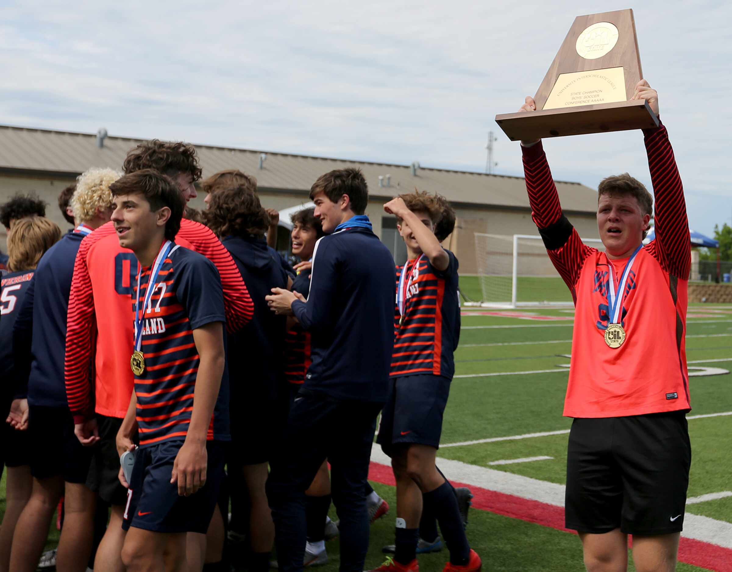 Frisco Wakeland's Connor Pettigrew (99) celebrates with teammates after their UIL 5A boys...