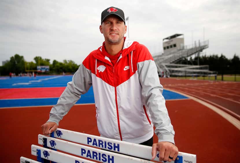 Parish Episcopal head track coach Jeremy Wariner poses for a photo at the school's stadium...