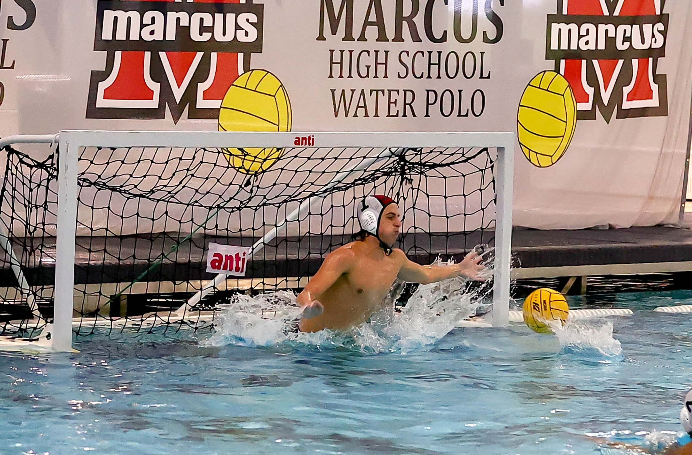 Southlake Carroll goal keeper Ryan Bradford tries to make a save against Flower Mound Marcus...