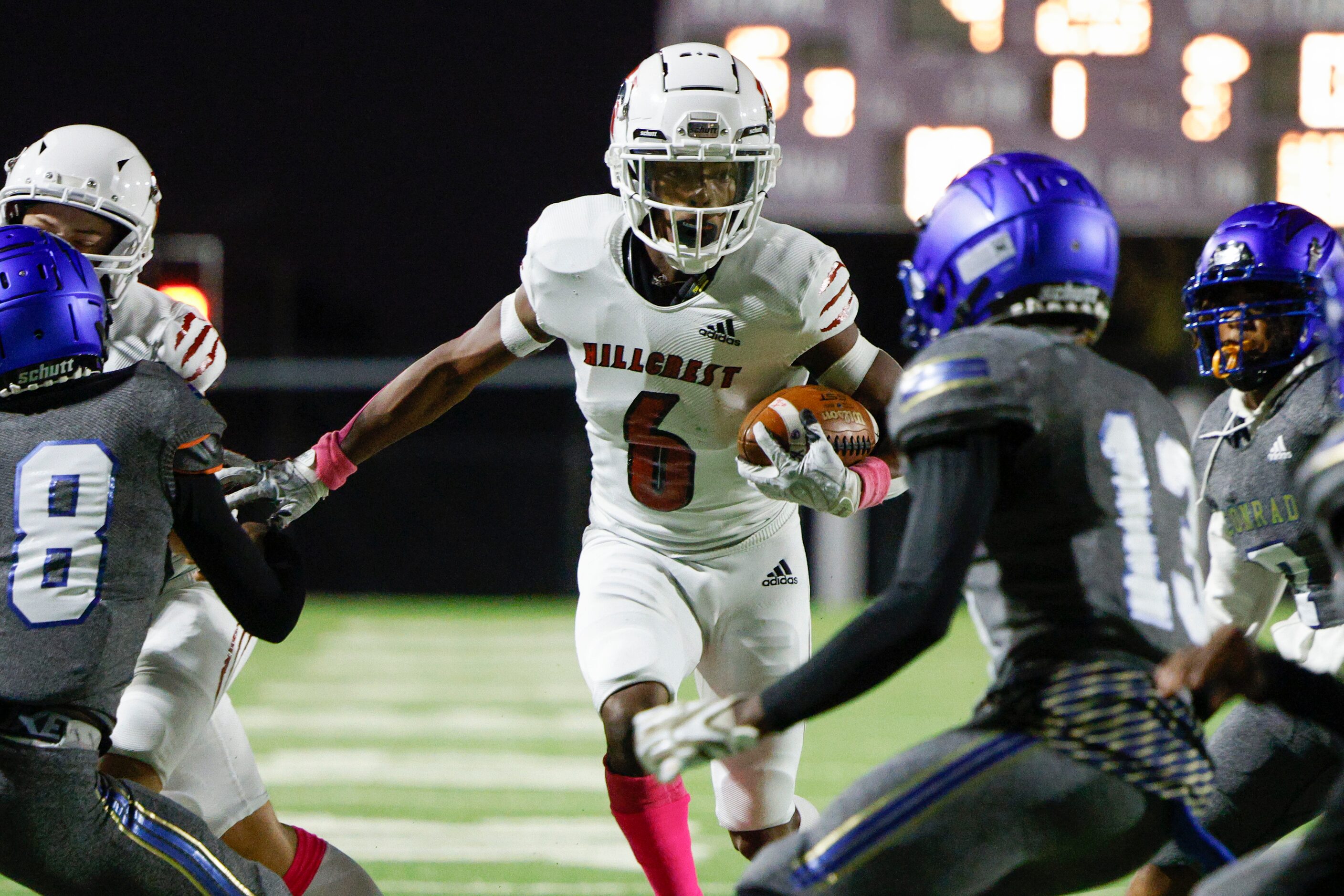 Hillcrest wide receiver Jaden Hodge (6) runs the ball between Conrad defensives back Marcus...