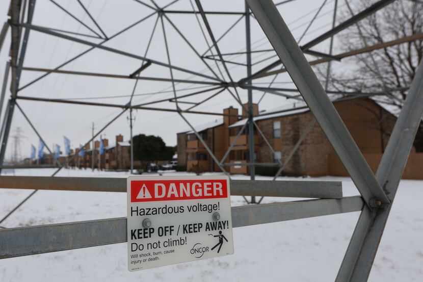 FORT WORTH, TX - FEBRAURY 17: A transmission tower supports power lines after a snow storm...