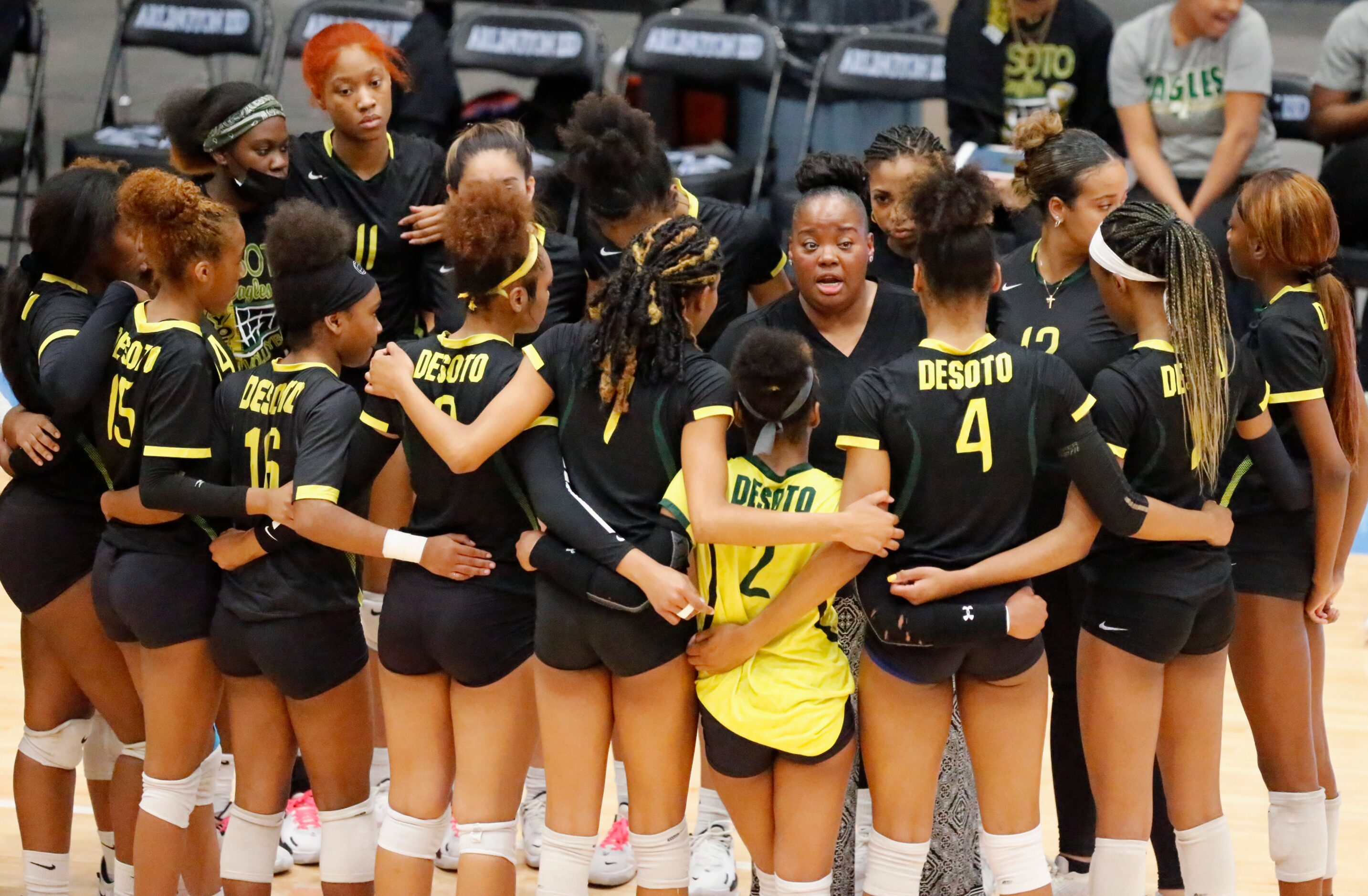 DeSoto High School head coach Rhea Reed talks to her team in time out during game two as...