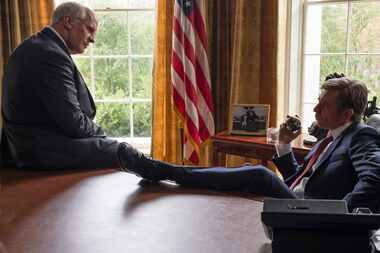 Christian Bale (left) as Dick Cheney and Sam Rockwell as George W. Bush in a scene from Vice.