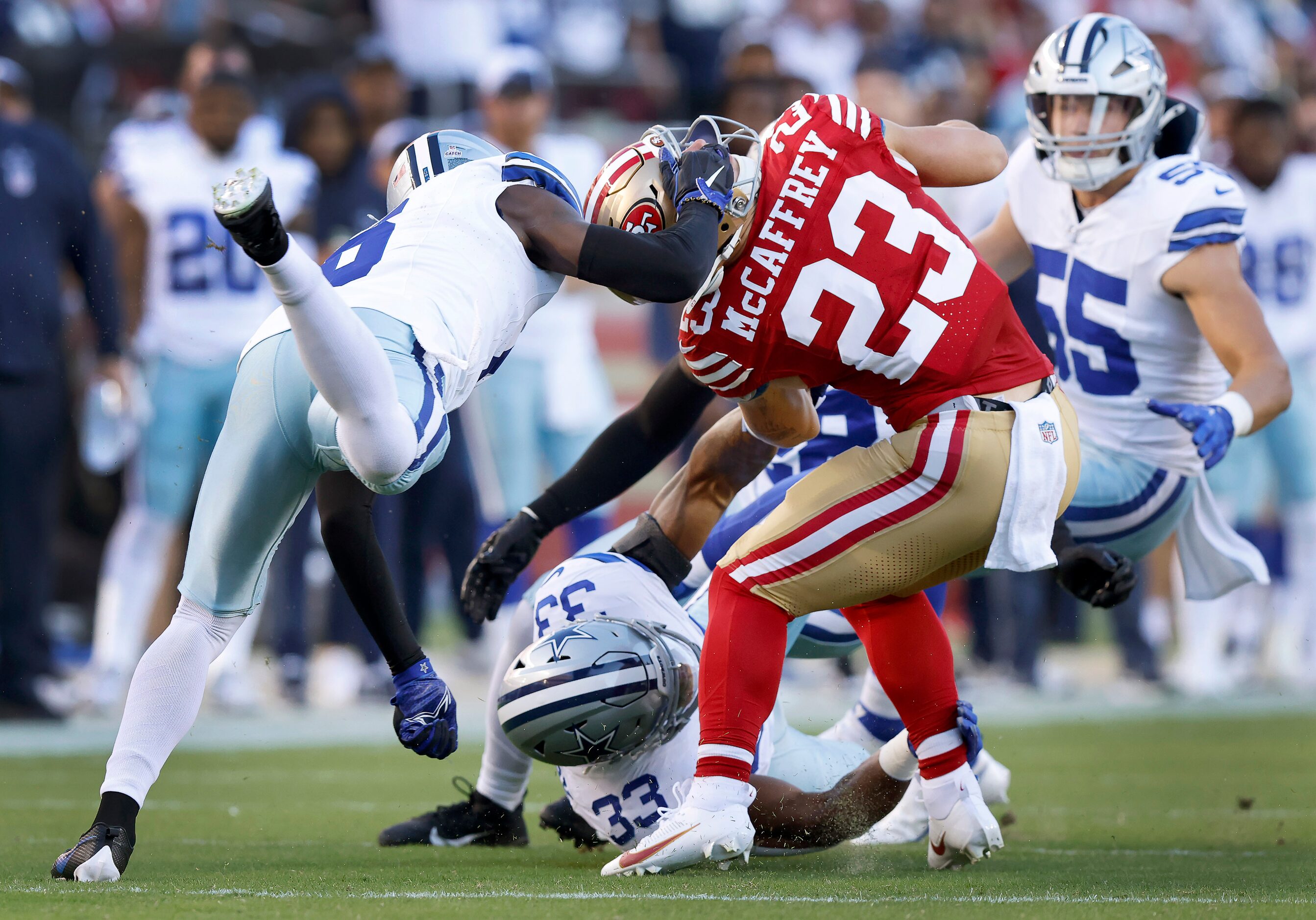 Dallas Cowboys safety Donovan Wilson (6) turns San Francisco 49ers running back Christian...